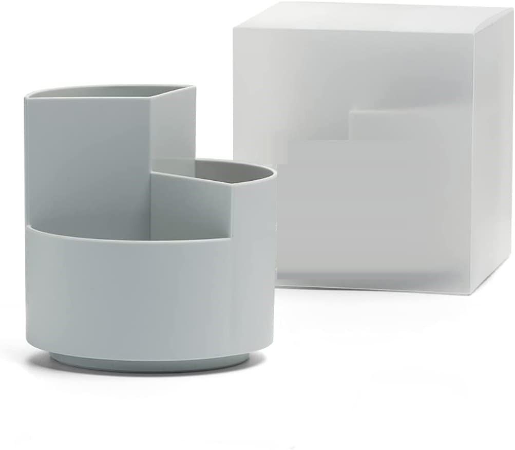 Two gray geometric planters on a white background
